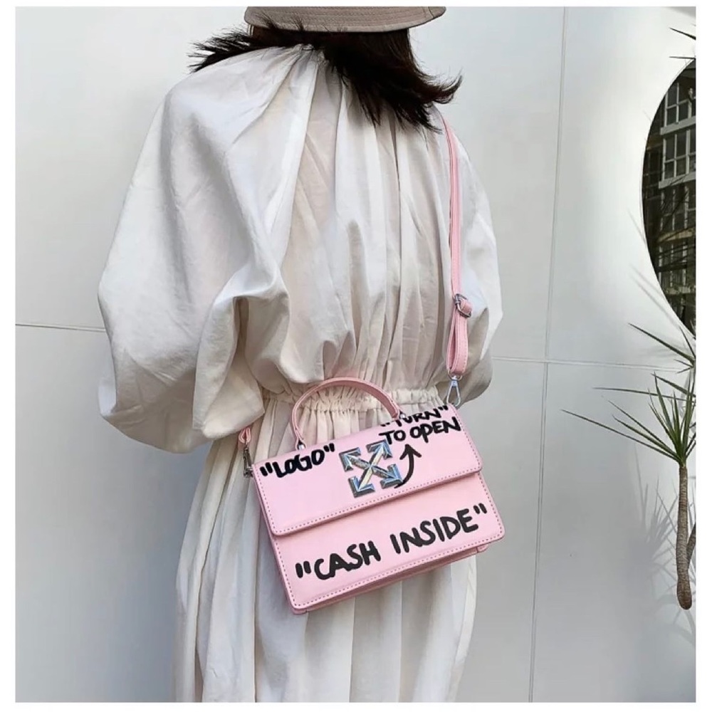 Cash inside logo purse
